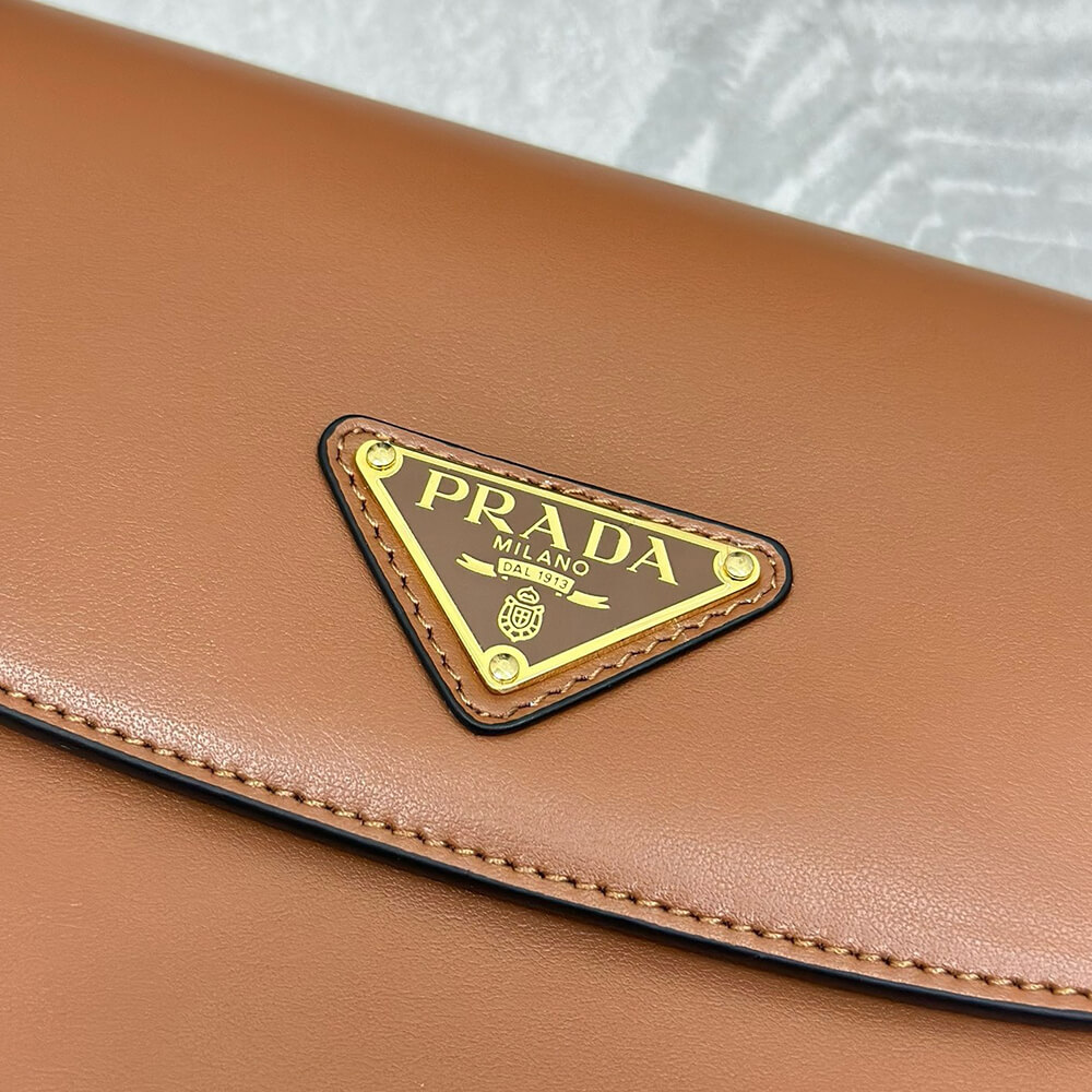 Pra*a Arque leather shoulder bag with flap